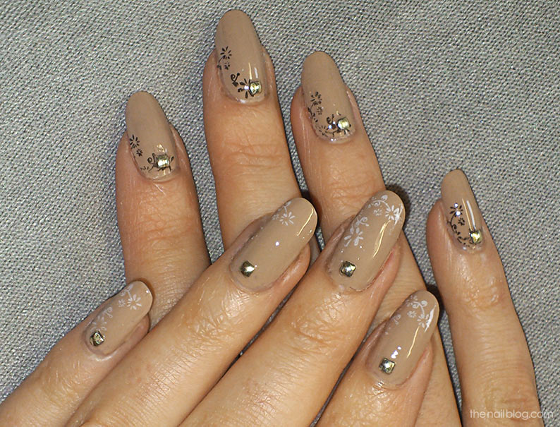 Nude nails with gold studs