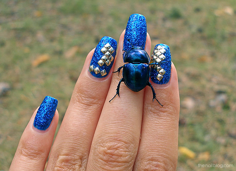 Glitter Blue Nails with Gold Studs